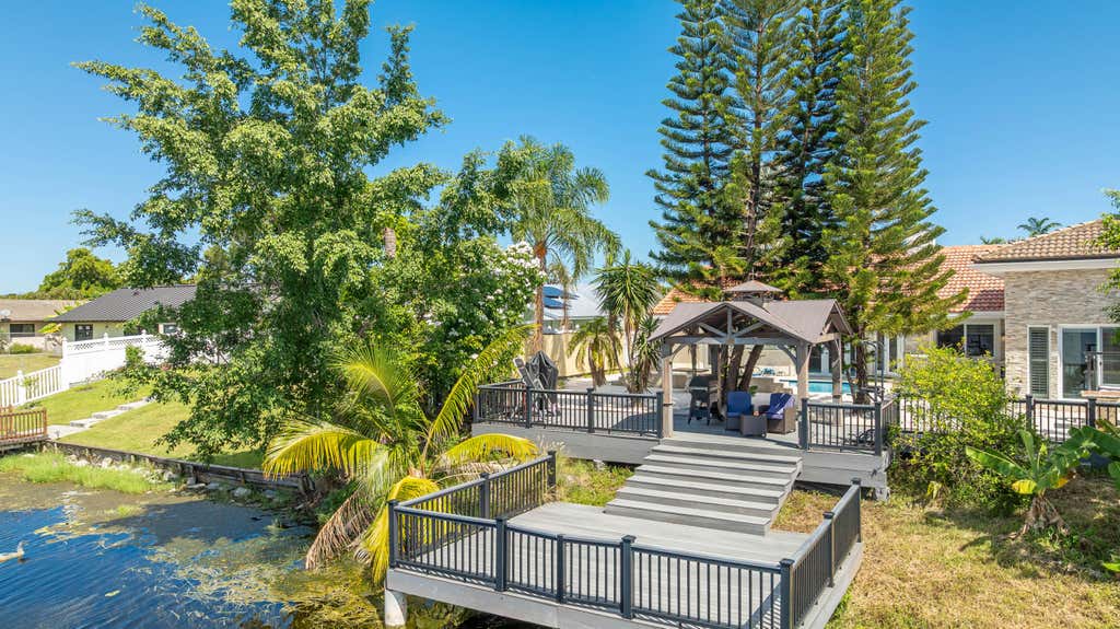 Photo of 2557 SW 14TH Court, Deerfield Beach, FL 33442 (MLS # B26067129)