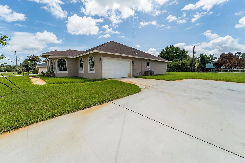 Photo of 376 SW Paar Drive, Port Saint Lucie, FL 34953 (MLS # B26009662)