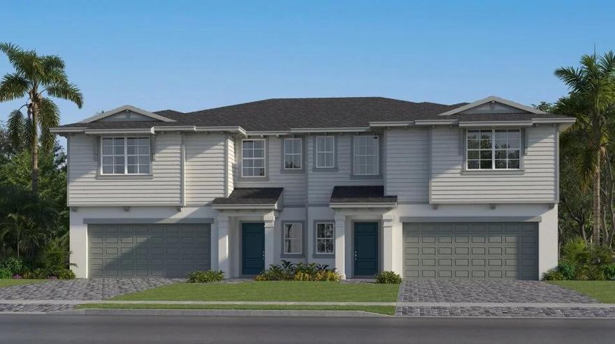The first floor of this new two-story twin home design presents the open-plan main living area, which includes the spacious Great Room, a fully equipped kitchen and lovely dining room. At the rear is a covered lanai for outdoor activities. On the top floor is a comfortable loft surrounded by three secondary bedrooms and the tranquil owner's suite. Completing the home is a two-car garage.Prices, dimensions and features may vary and are subject to change. Photos are for illustrative purposes only.