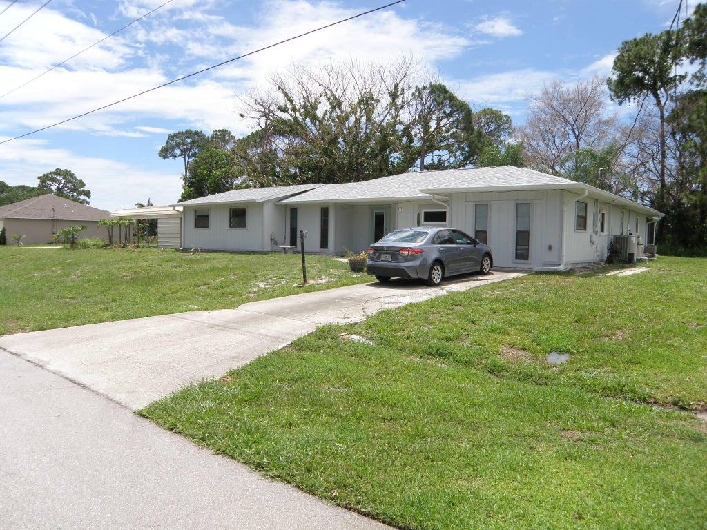 Photo of 322 SE WALTERS Terrace, Port Saint Lucie, FL 34983 (MLS # B26073248)