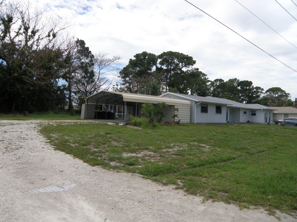 Photo of 322 SE WALTERS Terrace, Port Saint Lucie, FL 34983 (MLS # B26073248)