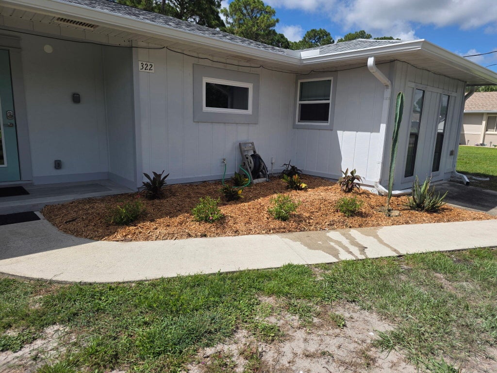 Photo of 322 SE WALTERS Terrace, Port Saint Lucie, FL 34983 (MLS # B26073248)