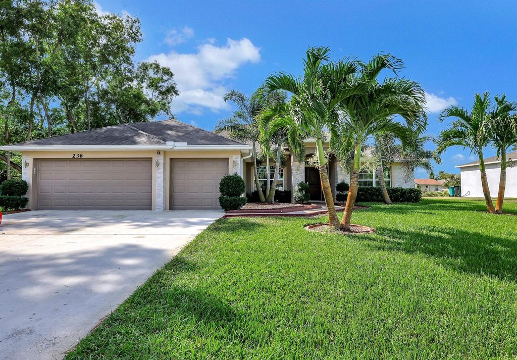 Photo of 236 SW Covington Road, Port Saint Lucie, FL 34953 (MLS # R10932564)