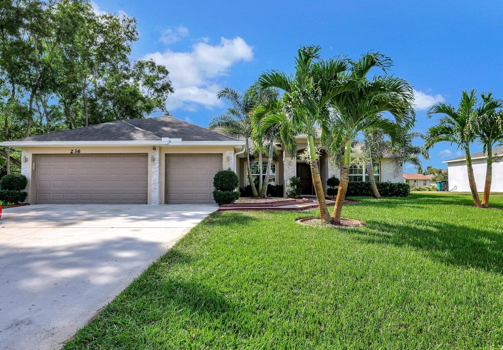 Photo of 236 SW Covington Road, Port Saint Lucie, FL 34953 (MLS # R10932564)