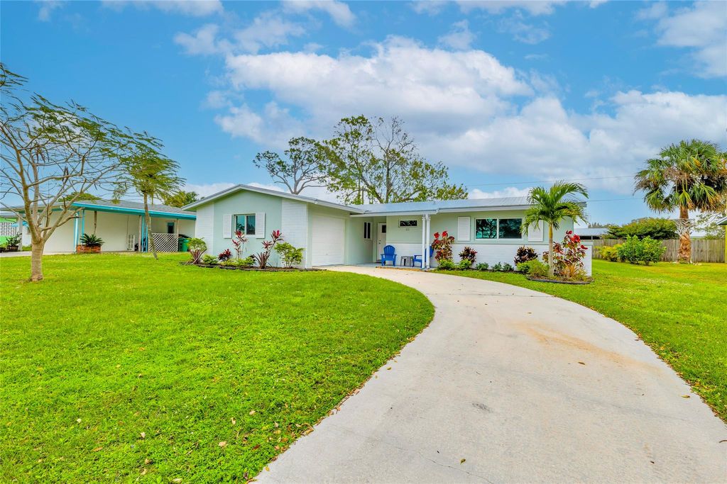 Photo of 323 Shady Lane, Port Saint Lucie, FL 34952 (MLS # F10416612)