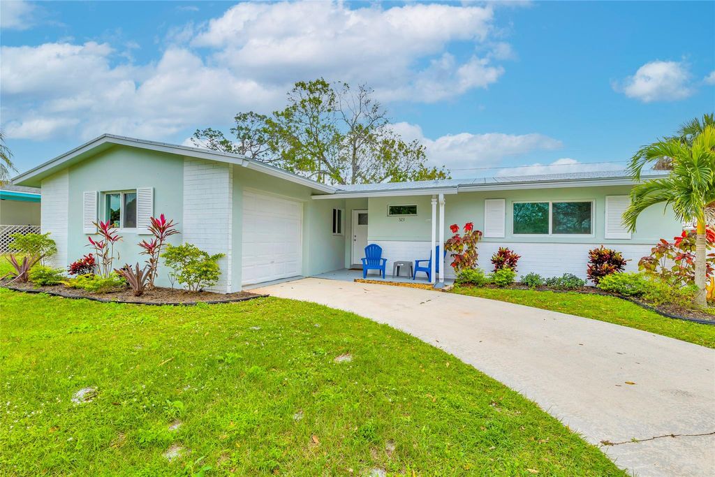 Photo of 323 Shady Lane, Port Saint Lucie, FL 34952 (MLS # F10416612)