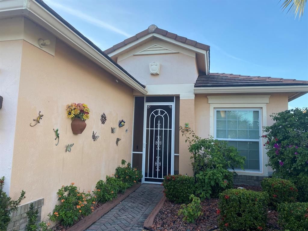 Photo of 9611 SW Glenbrook Drive, Port St Lucie, FL 34987 (MLS # R10857143)