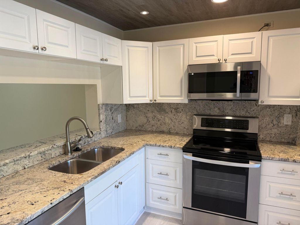 Photo of 5150 E Club Circle #202, Boca Raton, FL 33487 (MLS # B26021324)