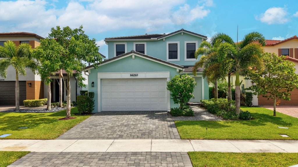 Photo of 16210 SANDY SHORE Drive, The Acreage, FL 33470 (MLS # B26067341)
