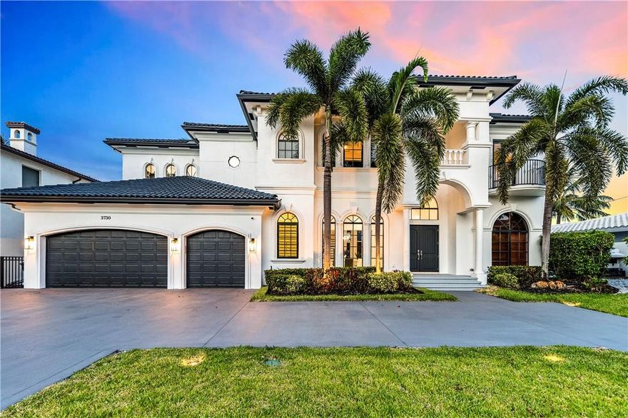 Absolutely spectacular waterfront mansion in Lighthouse Point. The pool sits directly on 90ft of waterfront w/ ocean access, NO FIXED BRIDGES, and a gazebo. Inside and out you won't find an inch that has not been fully remodeled. The ultra-sleek 4 bed, 4.5 bath home consists of open spaces, large impact windows that allow tons of natural light, neutral floors and walls accentuated by dark wood tones, an iron rod staircase, high ceilings, and water views from almost every room. An elevator will take you from the spacious first story into the master suite upstairs. Spacious kitchen with top-of-the-line appliances, and a large office in addition to the rooms. Excellent location minutes from the ocean, airport, downtown Ft. Lauderdale, and much more!