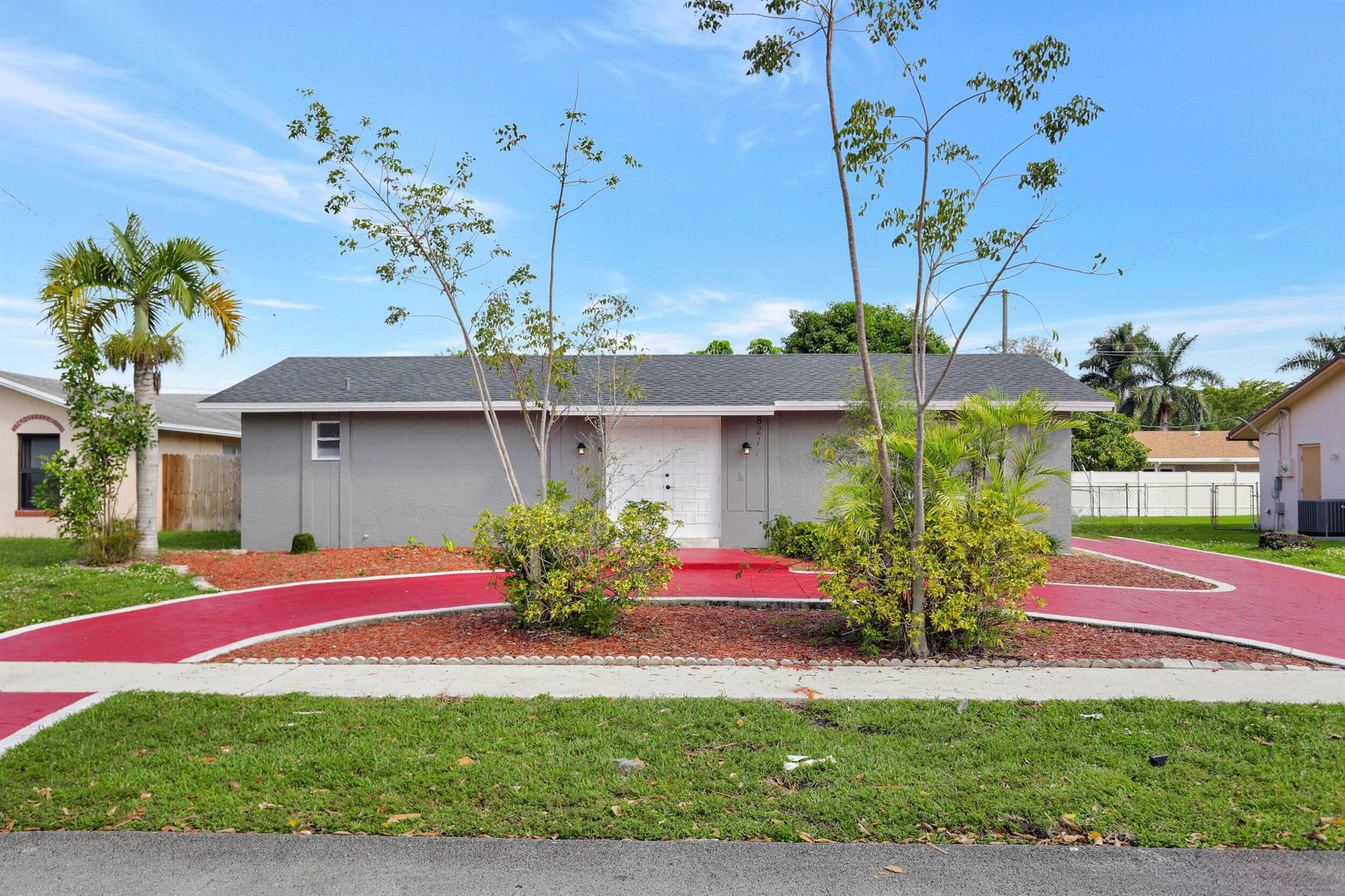 This spacious pool residence features three bedrooms and two bathrooms, along with a generously sized fenced backyard. Situated in a wonderful family-oriented neighborhood, it is conveniently located across from a park. The interior boasts updated flooring, new kitchen, new bathrooms and freshly painted. Additionally, the home includes a washer and dryer. The master bedroom offers a separate bath for added privacy. The landlord covers the cost of pool maintenance. Residents can enjoy the nearby walking/fitness trail, tennis and racquetball courts. The property's prime location provides easy access to Sawgrass Mills, shopping centers, dining options, highways, and more. This vacant home is ready for immediate occupancy, ensuring a quick move! Tenant resp. for lawn care.