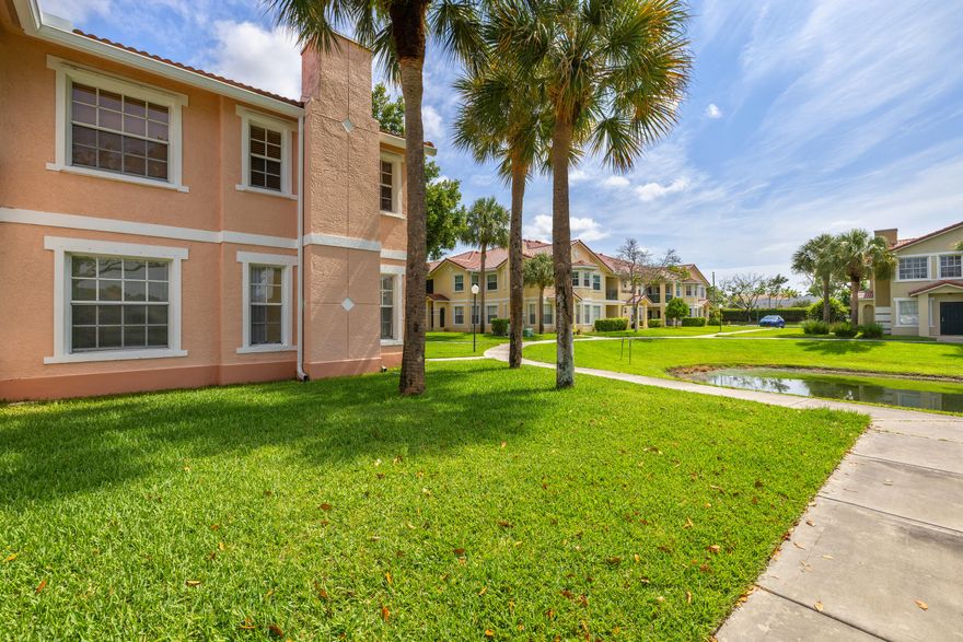 Fantastic opportunity to lease this beautifully maintained 3-bedroom, 2-bathroom upstairs condo in a highly desirable luxury gated community featuring a split-bedroom floor plan, private balcony, full-size washer and dryer, separate laundry room, and tranquil water views from the family room and bedrooms. Enjoy resort-style amenities including a swimming pool, fitness center, tennis courts, scenic lakes, clubhouse, and gated security. Rent includes water, valet trash service, and full access to community amenities. Conveniently located near shopping, dining, and major highways with reduced upfront move-in costs—don't miss this exceptional rental opportunity!