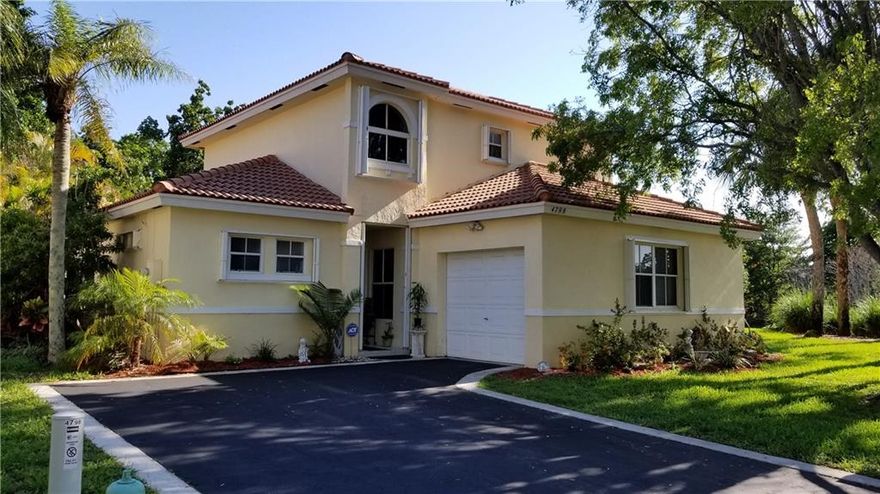 Oversized corner lot with water view. Very private and accordion hurricane shutters throughout. Cute house with a beautiful water view.  Large yard.  2 master suites== 1 upstairs and one downstairs.  The master suite upstairs shares the bathroom with second room.  Dining area, family room. All ages, pets welcomed with restrictions.