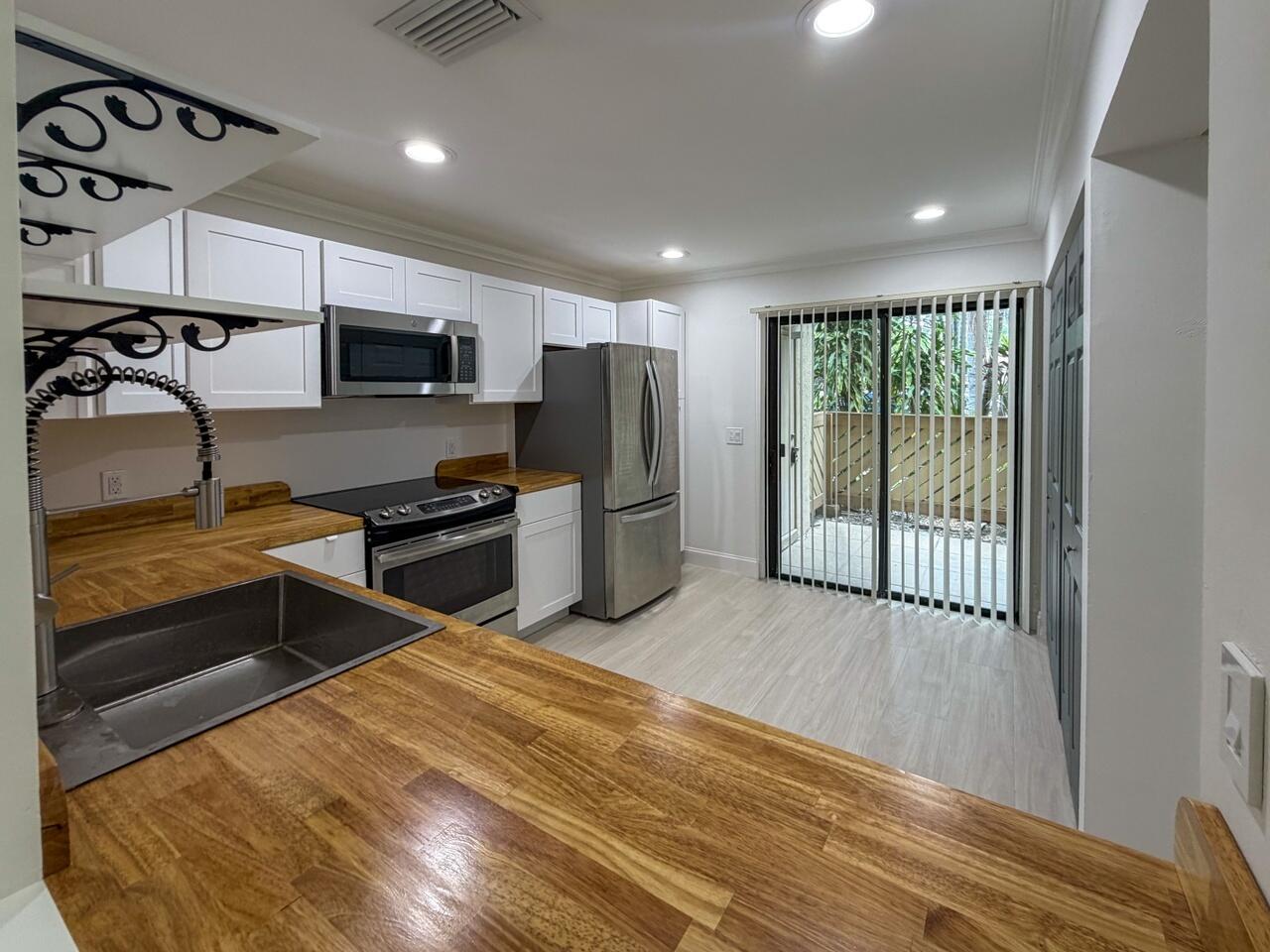 SHEFFIELD WOODS AT WELLINGTON CONDO - Residential Lease