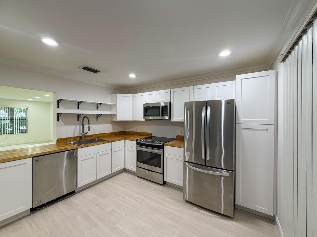 SHEFFIELD WOODS AT WELLINGTON CONDO - Residential Lease