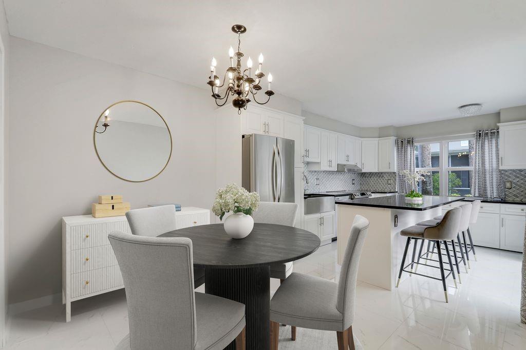 Beautifully Updated 2BD/2.5BTH Townhome in the Desirable Gated Community of Sunset Trace! Features Include a Remodeled Kitchen w/ Quartz Counters, Marble Backsplash, Spacious Central Island & New SS Appliances, Plus Updated Flooring Throughout, Impact Windows, Fresh Interior Paint, & a Recently Painted Large Patio w/ Refreshed Landscaping. Enjoy Indoor-Outdoor Living w/ a Screened-In Patio & Dual Primary Suites Upstairs. Resort-Style Amenities: 2 Large Pools, Tennis, Basketball, Clubhouse, & 24Hr Manned Gate. Prime Palm City Location Near A-Rated Schools, Shopping, Beaches, I-95 & Turnpike.