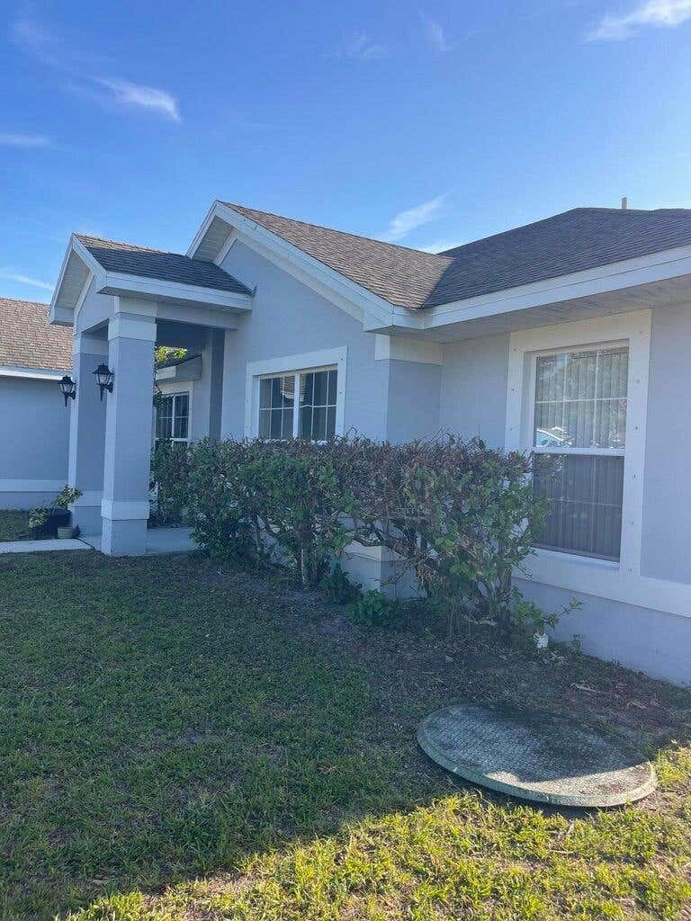 Photo of 688 SW HEATHER Street, Port Saint Lucie, FL 34983 (MLS # B26063090)