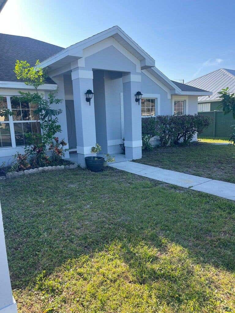 Photo of 688 SW HEATHER Street, Port Saint Lucie, FL 34983 (MLS # B26063090)