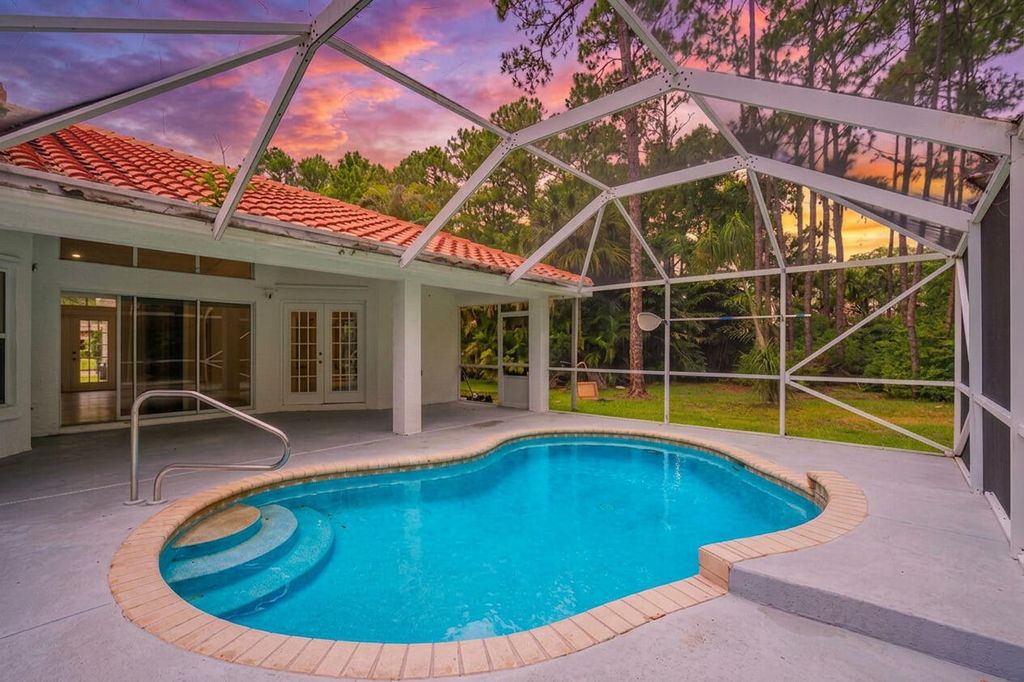 Photo of 15845 83rd Lane N, The Acreage, FL 33470 (MLS # B26034814)