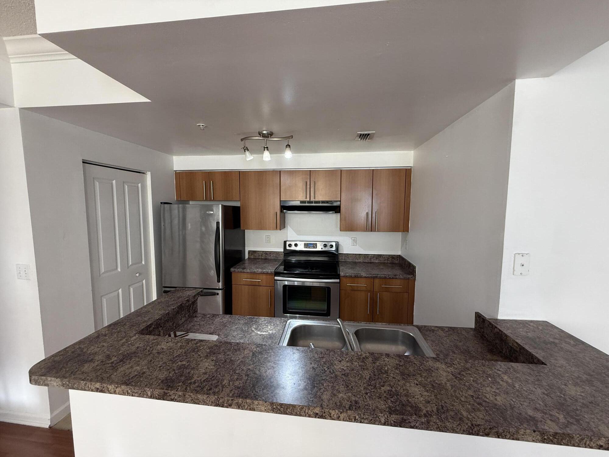 EL-AD POINCIANA CONDO - Residential Lease