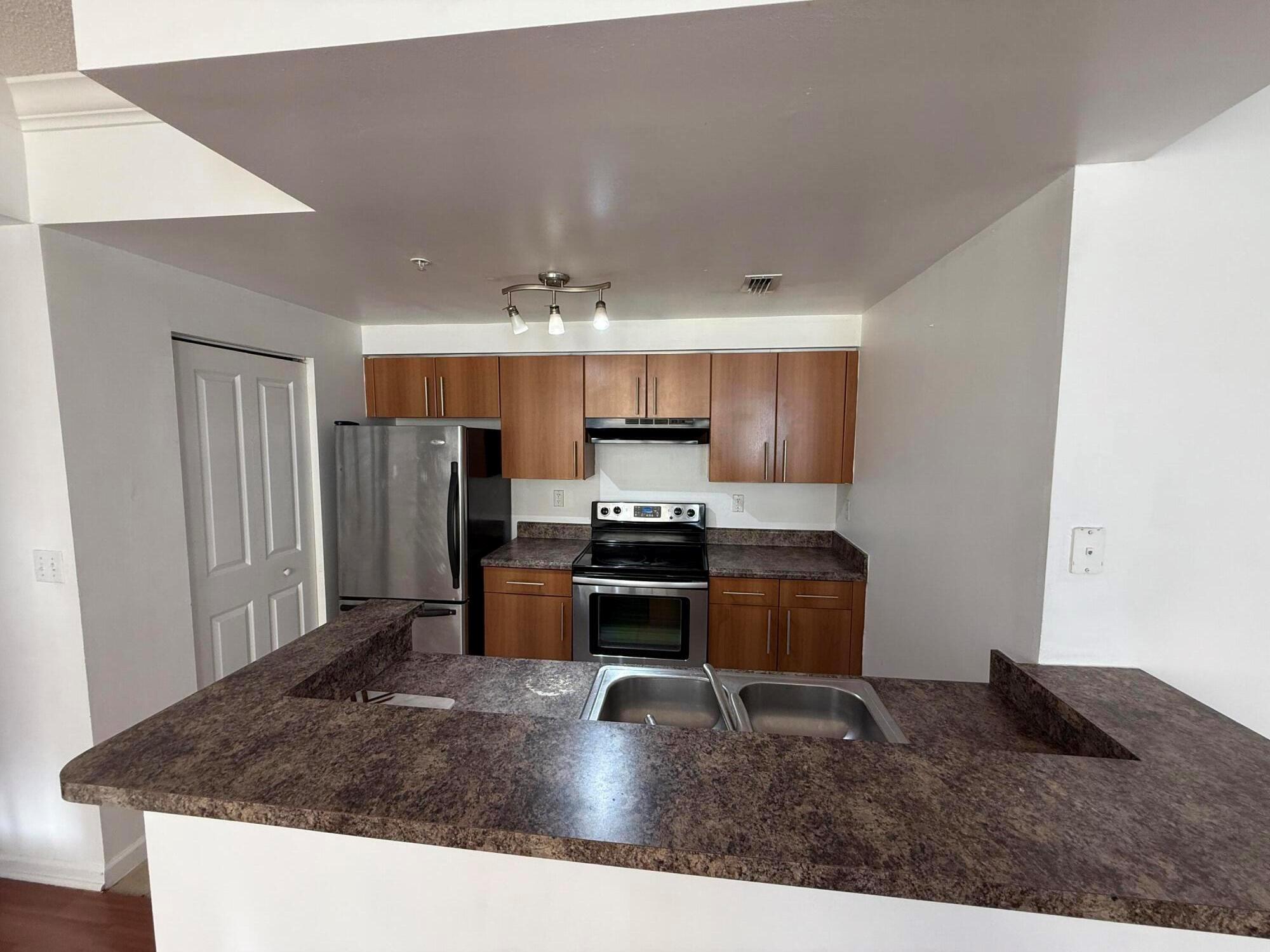 EL-AD POINCIANA CONDO - Residential Lease