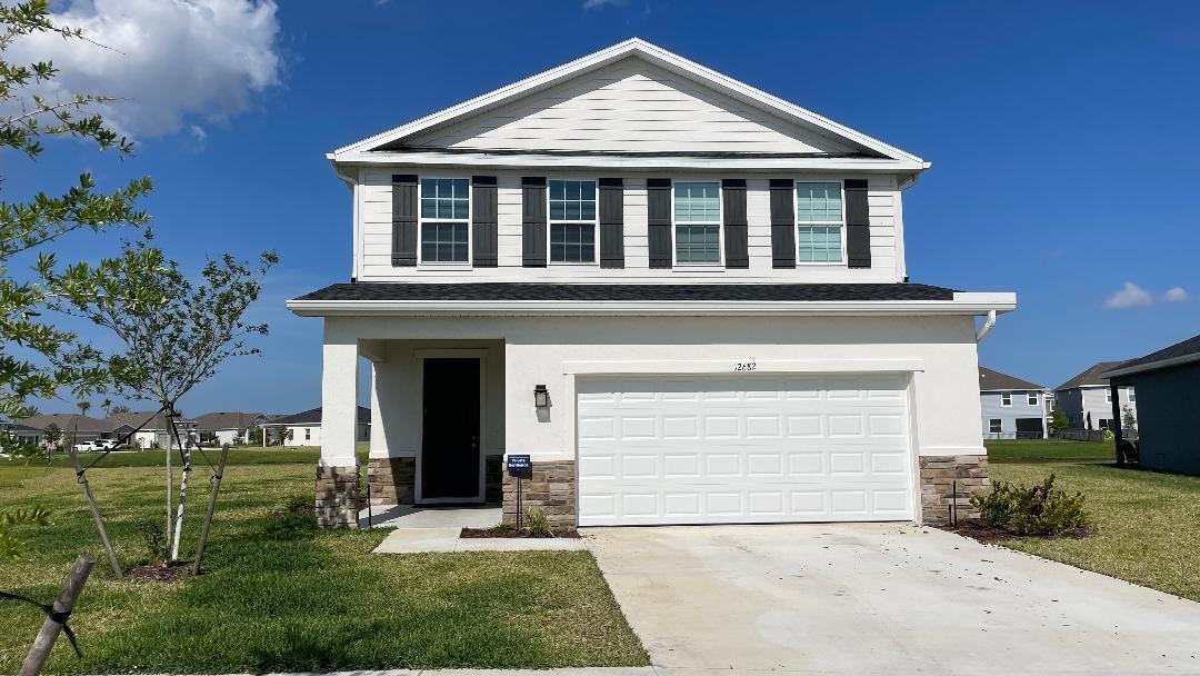 Central Park is fifteen minutes from several area beaches and recreation spots and less than five miles from I95 and the Florida Turnpike. Ten acres of land include a pool, splash park, cabana, snack bar, picnic area, walking paths, and a dog park. There are several sports courts, including pickleball, tennis, and basketball. The Windermere is a two-story 5 bed, 3 bath,2 car garage, and loft. Spacious kitchen with 42'' cabinets, and an open layout. WIFI garage opener and Ecobee thermostat.