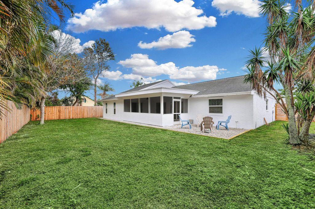 Photo of 5646 SE Sailfish Way, Stuart, FL 34997 (MLS # R11054125)