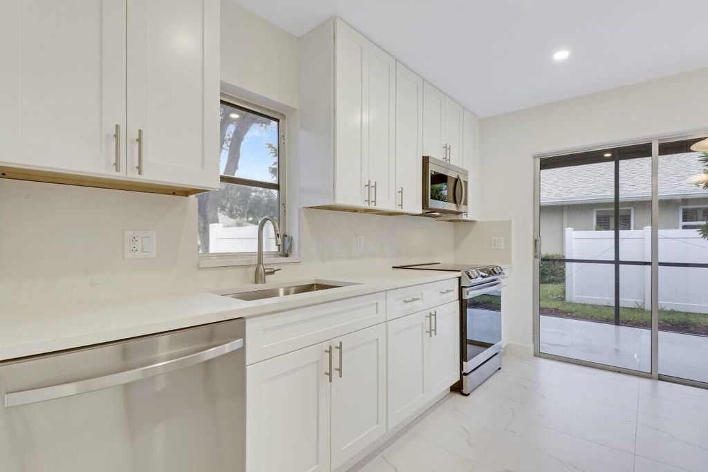 Photo of 18718 Candlewick Drive, Boca Raton, FL 33496 (MLS # R10943669)