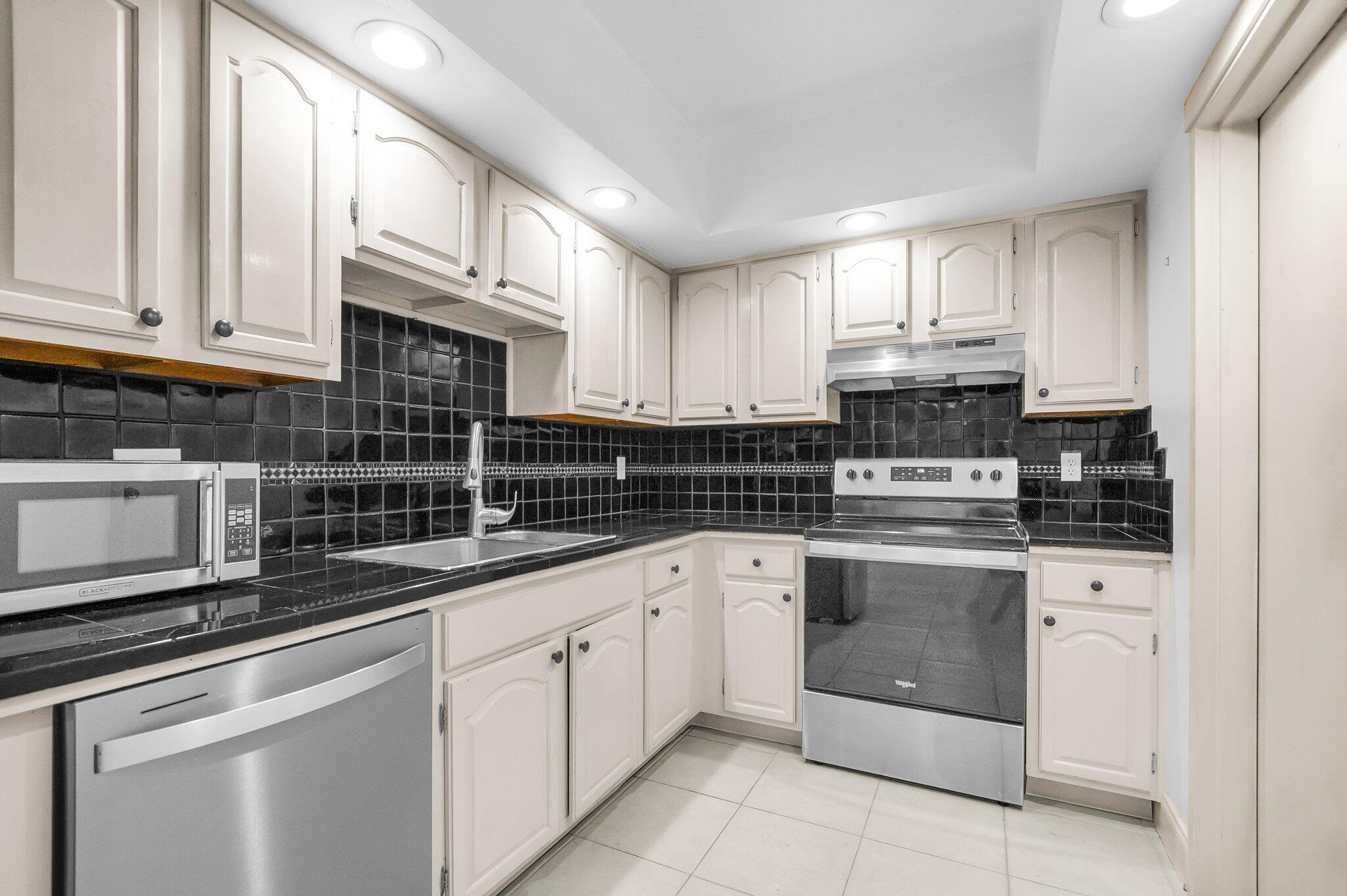 WILLOW WOOD MIDRISE CONDO - Residential