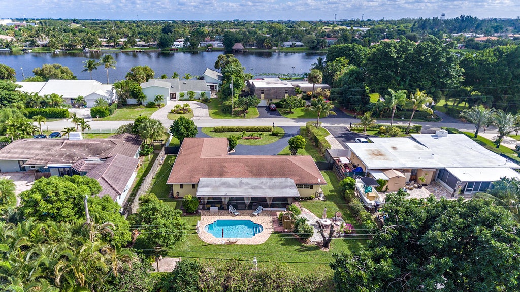Photo of 7315 W Lake Drive, West Palm Beach, FL 33406 (MLS # B26085804)