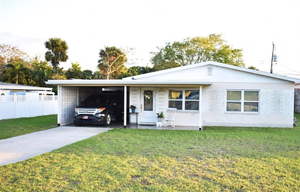 Photo of 1618 NE Sunview Terrace, Jensen Beach, FL 34957 (MLS # R10694605)