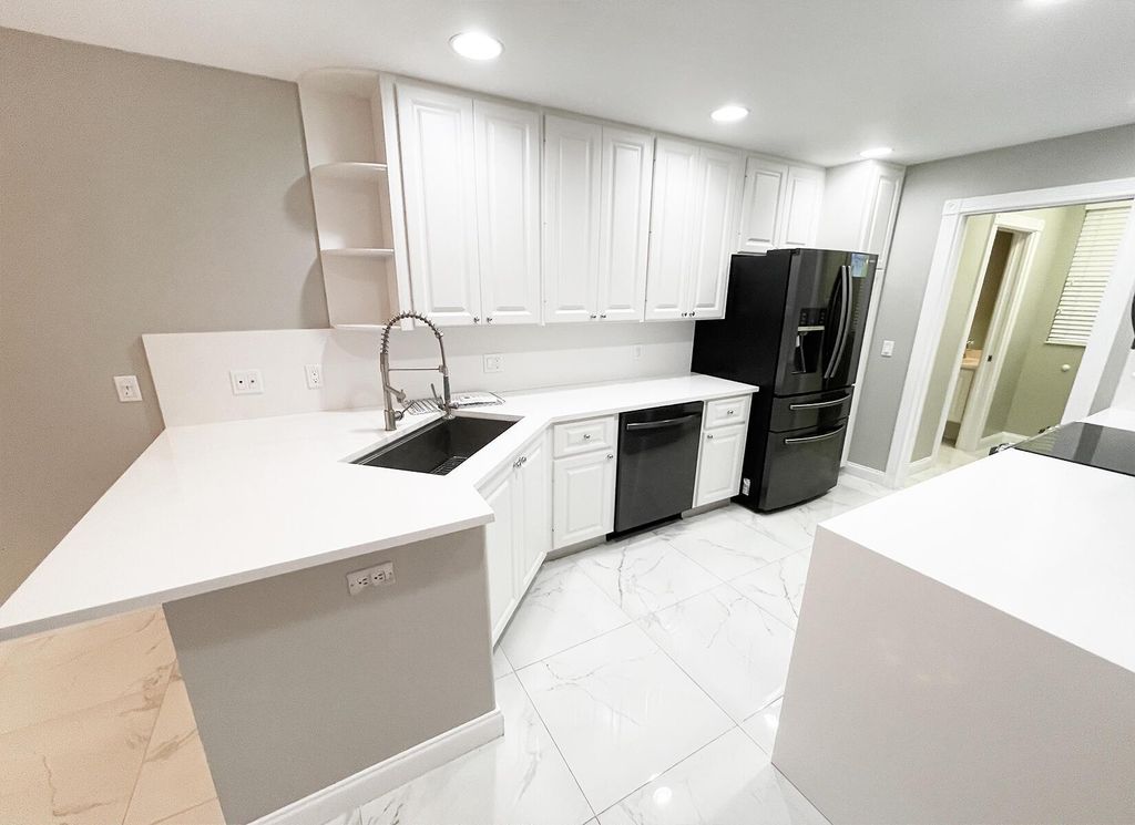 Photo of 134 Santa Barbara Way, Palm Beach Gardens, FL 33410 (MLS # R11061494)