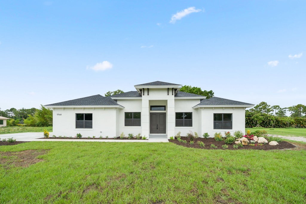 Photo of 17568 Valencia Boulevard, The Acreage, FL 33470 (MLS # R10996535)