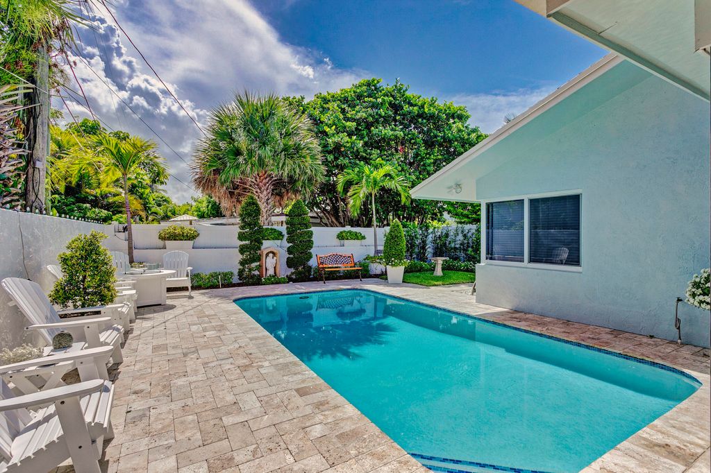 Photo of 430 Mars Way, Juno Beach, FL 33408 (MLS # R10988444)