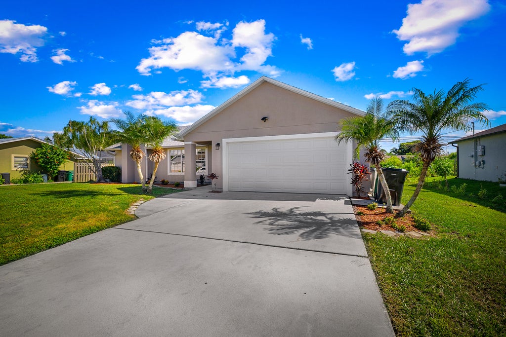 Photo of 1232 SW Wellington Avenue, Port Saint Lucie, FL 34953 (MLS # R11126075)