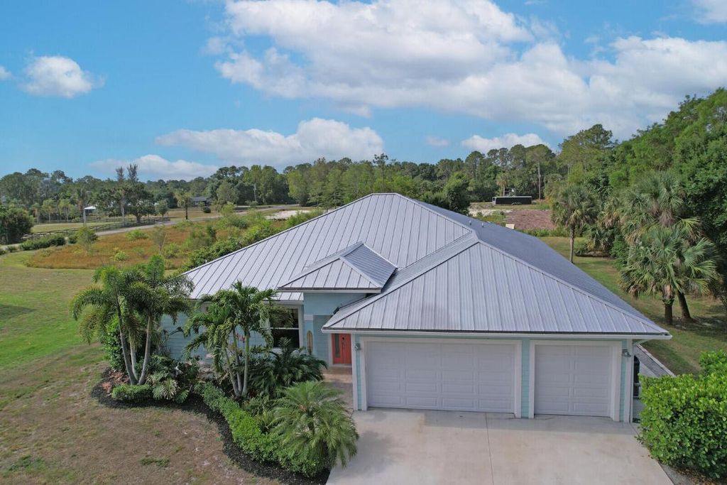 Photo of 11168 153rd Court N, Jupiter, FL 33478 (MLS # R10988150)