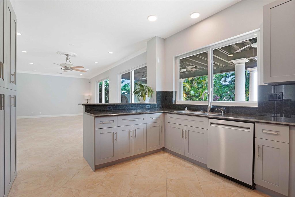 Photo of 1828 NW 48th Terrace, Coconut Creek, FL 33063 (MLS # F10539219)