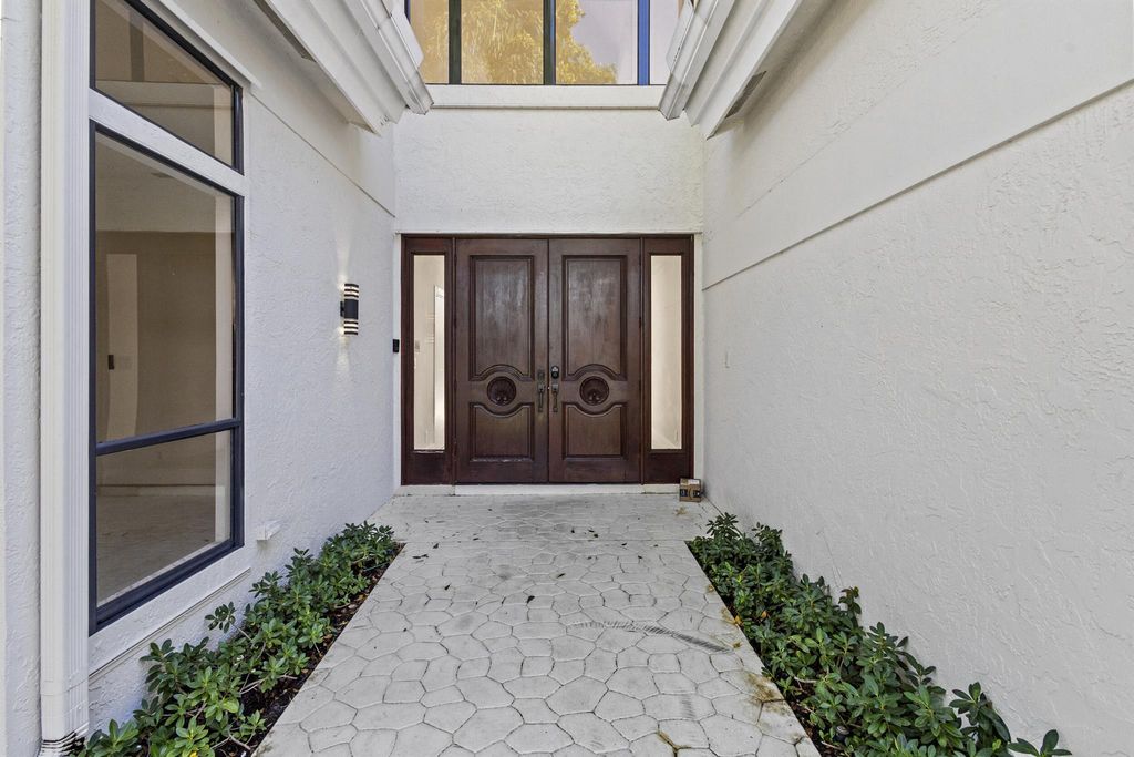 Photo of 4798 NW 25th Way, Boca Raton, FL 33434 (MLS # R11130948)