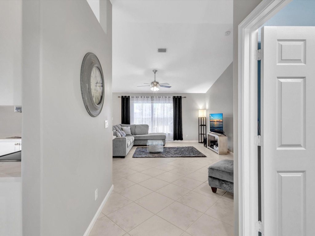Photo of 1581 SW Delos Avenue, Port Saint Lucie, FL 34953 (MLS # F10450866)