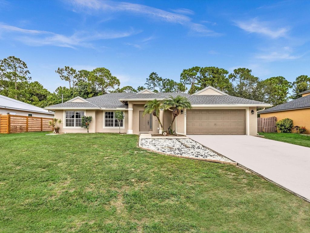 Photo of 1581 SW Delos Avenue, Port Saint Lucie, FL 34953 (MLS # F10450866)