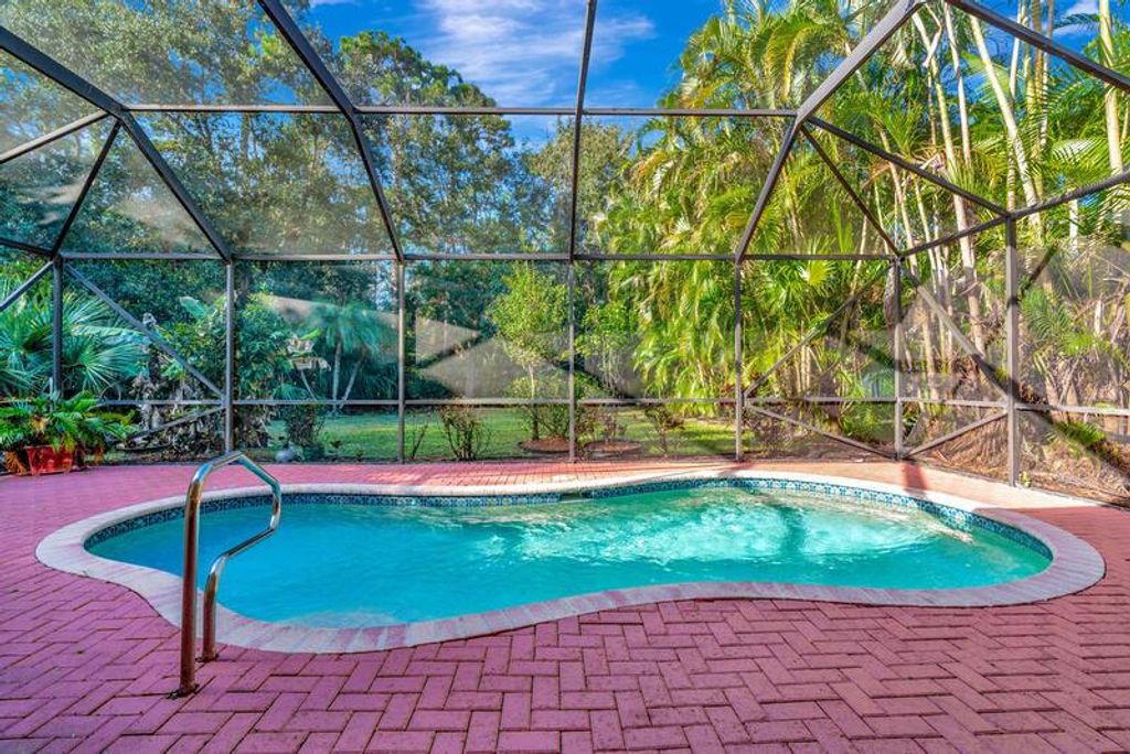 Photo of 8661 Green Cay, West Palm Beach, FL 33411 (MLS # R11040013)