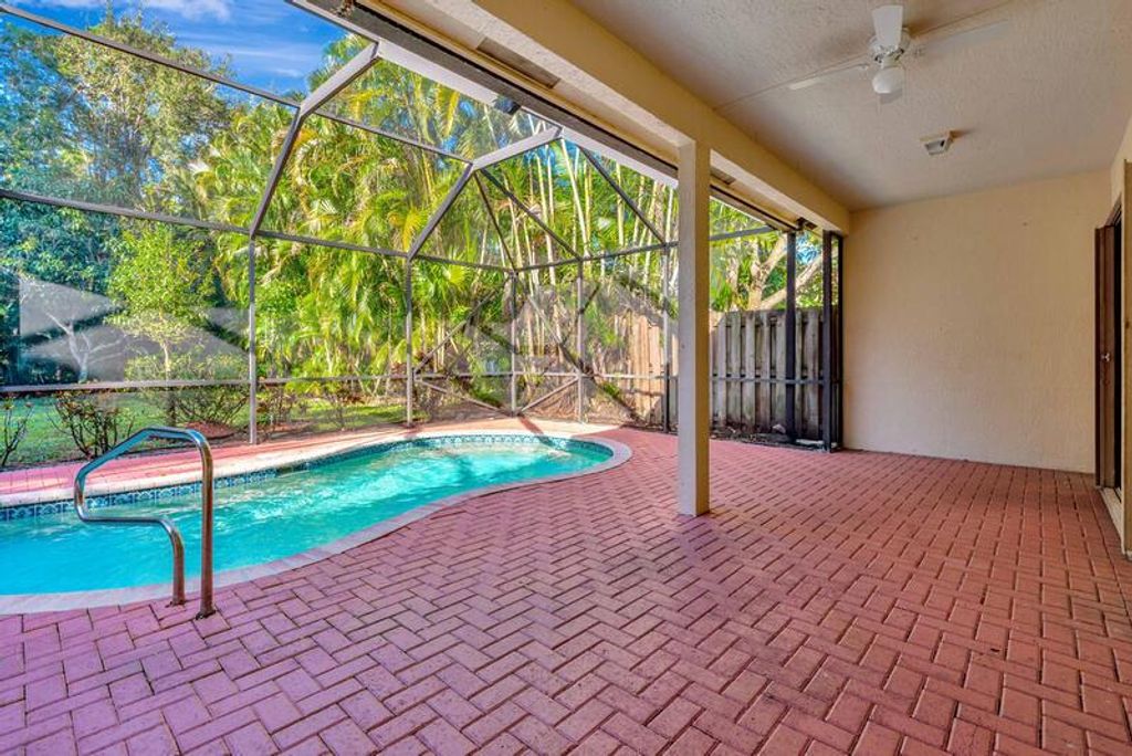 Photo of 8661 Green Cay, West Palm Beach, FL 33411 (MLS # R11040013)