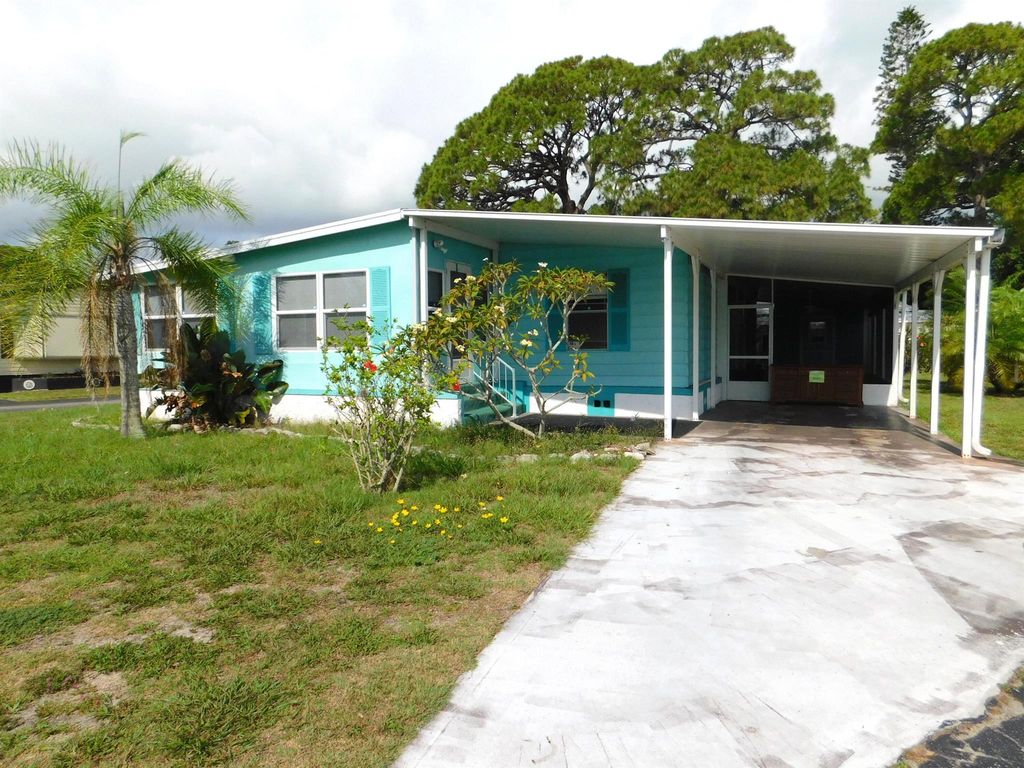 Photo of 304 Ottawa Way, Fort Pierce, FL 34946 (MLS # R11098576)