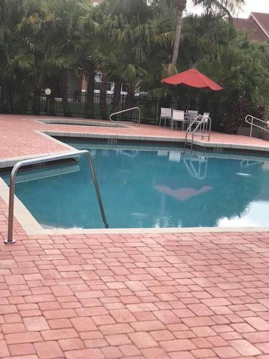 GORGEOUS 3 BED, 2 BATH CONDO IN A PRIVATE GATED COMMUNITY IN THE HEART OF CORAL SPRINGS. UNIT WAS COMPLETELY RENOVATED. BRAND NEW KITCHEN WITH STUNNING GRANITE COUNTERS & BACK SPLASH. ALL NEW WOOD CABINETRY AND BRAND NEW STAINLESS STEEL APPLIANCES. THE WHILE UNIT HAS BRAND NEW 24 X 24 DESIGNER PORCELAIN TILES THRU-OUT.  BRAND NEW WASHER AND DRYER INSIDE LAUNDRY ROOM WITHIN THE UNIT. ALL NEW LIGHT FIXTURES.  STUNNING LARGE GRANITE BREAKFAST BAR. BATHROOMS WERE RENOVATED WITH MODERN NEW DESIGNER TILES. BOTH BATHROOM FEATURE EXTRA LARGE VANITIES ADORNED BY GRANITE TOPS AND WHITE VESSEL SINKS. THIS CONDO IS LOCATED ON THE 1ST FLOOR JUST STEPS AWAY FROM THE BEAUTIFUL COMMUNITY POOL, CLUBHOUSE AND FITNESS AREA. THE BUILDING IS LOCATED ON THE LAKE. FAMILY FRIENDLY COMMUNITY