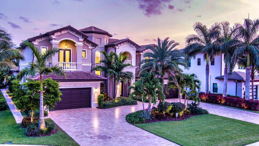 Constructed in 2020 by award-winning builders GL Homes and located in the heart of the gated enclave of Boca Bridges, this furnished transitional-style six-bedroom seven-bathroom, four-car garage estate spans and impressive 6,912± square feet of living space. Nestled in the coveted city of Boca Raton, Florida, the gated enclave of Boca Bridges is in the city's center, granting its residents access to upscale dining and shopping, A-rated schools, and immaculate beaches. 

Boca Bridges epitomizes the ultimate South Florida lifestyle, fusing sophisticated resort-style features with family-oriented amenities. The community's 27,000-square-foot clubhouse boasts a resort style pool, modern gymnasium equipped with innovative machinery, yoga room, playground, and indoor and outdoor sports courts. 

Ensconced amongst towering palms and manicured grounds, this grand lakefront estate exudes a refined opulence. The backyard oasis, designed by the renowned Lucas Lagoons, is a lush paradise expertly curated for residents to luxuriate in style with its crystal-clear pool, enchanting waterfalls, grotto, swim-up bar, hot tub, and fire features. 

The summer kitchen provides the perfect opportunity to entertain guests, while the tiki bar creates an idyllic space to host intimate gatherings. Amidst the verdant surroundings, residents can relax and unwind in the tranquility of this luxurious retreat, away from the hustle and bustle of everyday life.

This stunning estate opens to a beautifully appointed foyer with high volume tray ceilings, gorgeous custom accents, and stately windows that offer striking views of the surroundings.
Inside, the estate's spacious open concept living room features a custom porcelain fireplace feature wall, exquisite mantle framed by custom built ins and designer light fixtures. Stately windows throughout the home allow natural light to flow and provide pristine lakefront views.

The estate's secondary living space includes custom built ins, crown molding, LED lighting, and PGT windows and sliders which allow natural light to flow throughout the estate's interior.
The modern kitchen exudes practicality and elegance with beautiful wood cabinetry, dual chef islands, and Wolf appliances. The kitchen also features a large walk-in pantry and an informal family dining space, making it a central hub for everyday living and entertainment.

The spacious primary suite boasts dual walk-in closets, as well as luxurious bathroom encompassing two rainfall shower with wall jets. Additional highlights of the first floor include a formal dining room with a wet bar, a laundry room, a cabana bath leading to the pool deck and outdoor living space, and an office with custom built-ins and lighting.

Up the regal spiral staircase to the second floor are the remaining guest bedrooms, providing respective ensuite bathrooms and walk in closets. The second floor is also home to a modern game room and media room, perfect for hosting movie nights or watching the big game. The idyllic views from the second floor of the resort style grounds. This exceptional estate is a dream come true for anyone seeking luxury, elegance, and tranquility.  

DISCLAIMER: Information published or otherwise provided by the listing company and its representatives including but not limited to prices, measurements, square footages, lot sizes, calculations, statistics, and videos are deemed reliable but are not guaranteed and are subject to errors, omissions or changes without notice. All such information should be independently verified by any prospective purchaser or seller. Parties should perform their own due diligence to verify such information prior to a sale or listing. Listing company expressly disclaims any warranty or representation regarding such information. Prices published are either list price, sold price, and/or last asking price. The listing company participates in the Multiple Listing Service and IDX. The properties published as listed and sold are not necessarily exclusive to listing company and may be listed or have sold with other members of the Multiple Listing Service. Transactions where listing company represented both buyers and sellers are calculated as two sales. The listing company's marketplace is all of the following: Vero Beach, Town of Orchid, Indian River Shores, Town of Palm Beach, West Palm Beach, Manalapan Beach, Point Manalapan, Hypoluxo Island, Ocean Ridge, Gulf Stream, Delray Beach, Highland Beach, Boca Raton, East Deerfield Beach, Hillsboro Beach, Hillsboro Shores, East Pompano Beach, Lighthouse Point, Sea Ranch Lakes and Fort Lauderdale. Cooperating brokers are advised that in the event of a Buyer default, no financial fee will be paid to a cooperating Broker on the Deposits retained by the Seller. No financial fee will be paid to any cooperating broker until title passes or upon actual commencement of a lease. Some affiliations may not be applicable to certain geographic areas. If your property is currently listed with another broker, please disregard any solicitation for services. Copyright 2023 by the listing company. All Rights Reserved.