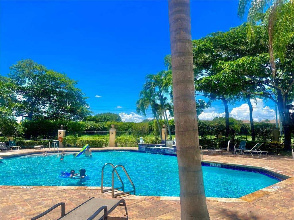 Photo of 1701 Village Boulevard #108, West Palm Beach, FL 33409 (MLS # R10931809)