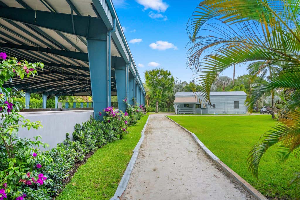 Photo of 1037 F Road, Loxahatchee Groves, FL 33470 (MLS # B26067930)