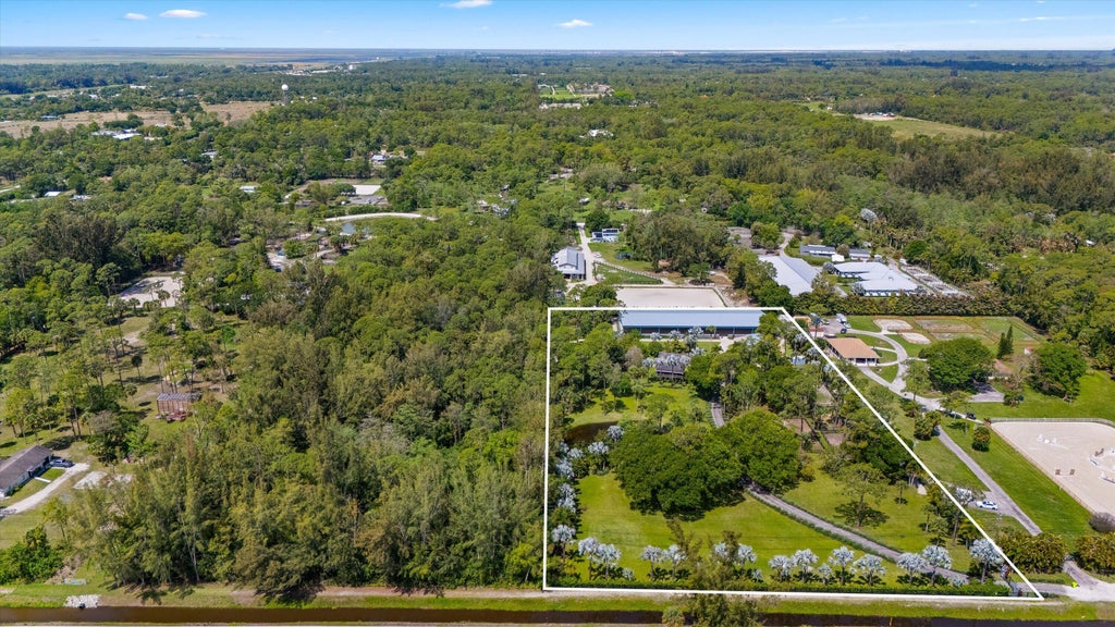 Photo of 1037 F Road, Loxahatchee Groves, FL 33470 (MLS # B26067930)