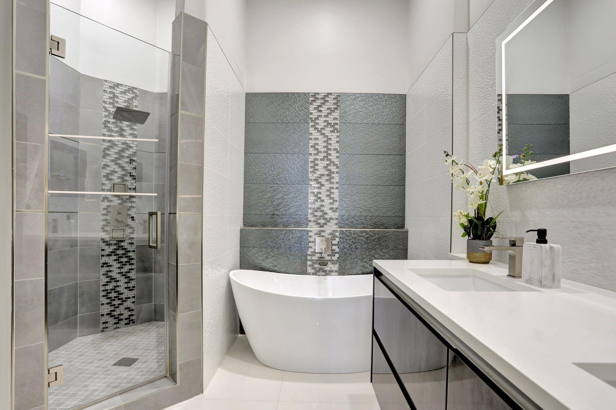 Impeccably maintained and modernly updated, this 3BR/2BA townhouse in guard-gated, pet-friendly Boca Pointe features a completely renovated kitchen and bathrooms, porcelain tile floors throughout (no carpet), and a 1-car garage. The home is offered furnished or partially furnished and includes a spacious enclosed balcony perfect for added living space. Newer tile roof (2020) and low-maintenance living. HOA includes landscaping, roof, building insurance, cable, security, and access to community satellite pool. Seasonal rental available with a 4-month minimum lease at $6,000/month. Centrally located in Boca Raton, zoned for A-rated schools, and close to shopping, dining, and beaches. Optional Boca Pointe Country Club membership available (not mandatory). Also available for sale.