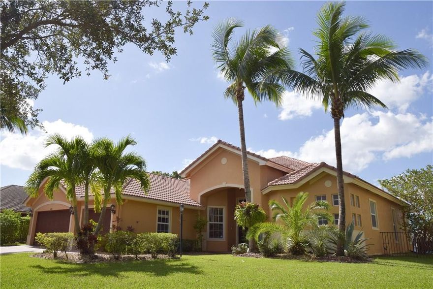 Parkland Isles/Bayside Estates - Stunning water & sunset views from this 1 story Bayshore model. 5 bed/3 bath, 3 car garage home with pool/spa, gourmet kitchen w/ stainless steel appliances, volume ceilings, triple split beds., Plantation & hurricane shutters. Spacious master suite, his/hers closets, double sinks & sitting area with tranquil water views. This home has a 1 YEAR HOME WARRANTY! A+ schools, resort style clubhouse w/ heated pool/spa, tennis, basketball, fitness ctr. & 24 hr. guard. HOA inc. internet, cable & alarm.